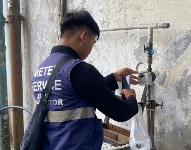 Engineers reviewing plans for water audit